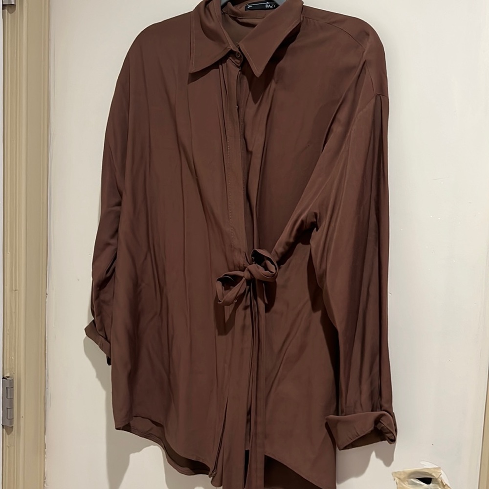 brown shirt with bow